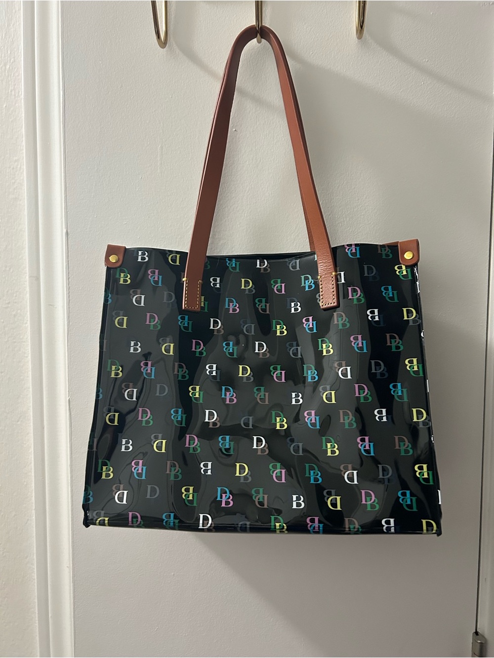 NWOT Dooney & Bourke Black Signature DB Tote with Logos and Brown Handles